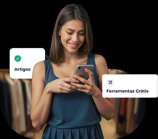 Mulher sorrindo enquanto usa o celular, com destaque para artigos e ferramentas grátis.